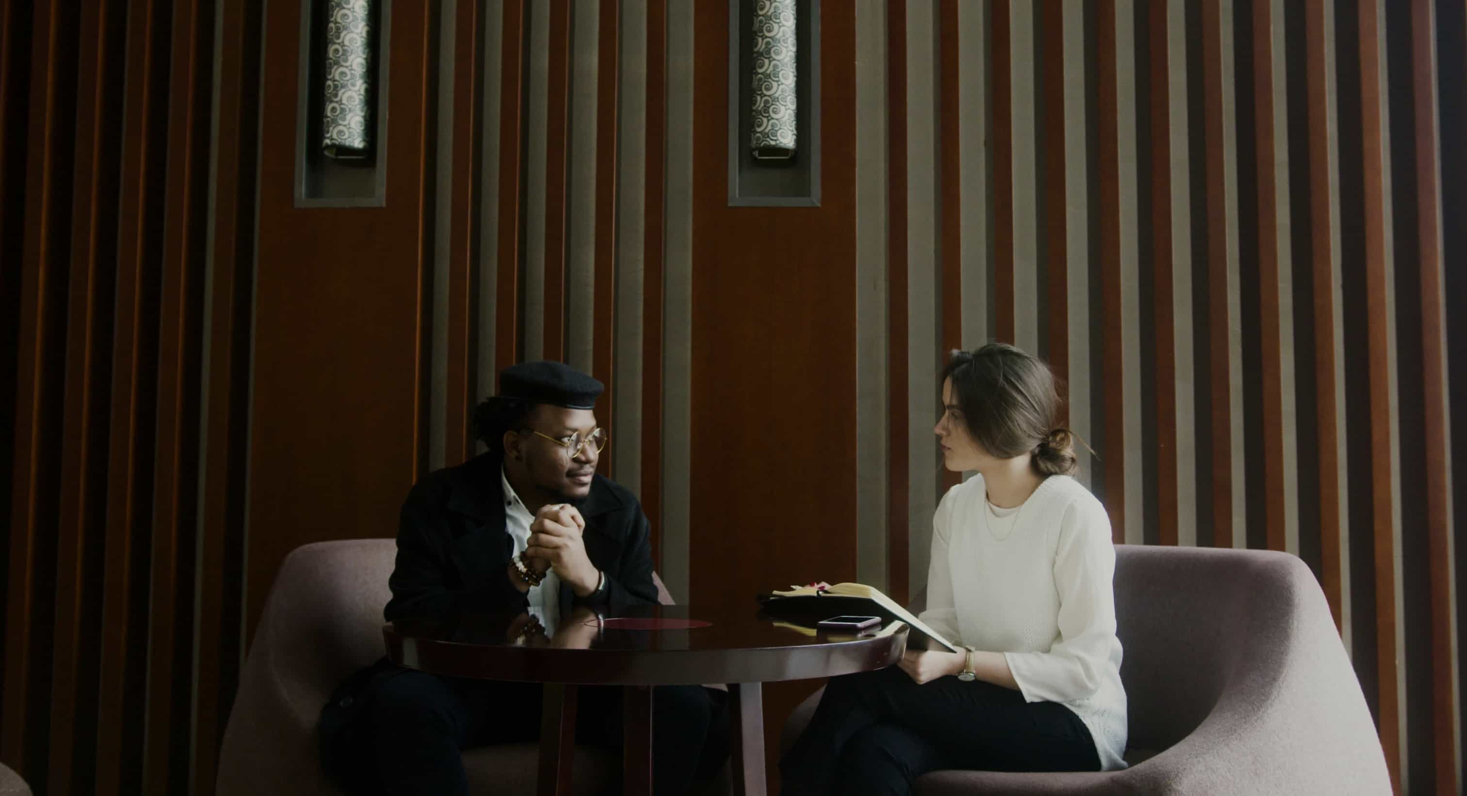 Two people talking